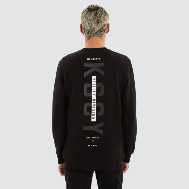 model wears Flicker Dual Curved Sweater Jet Black Jumpers Black - image 1