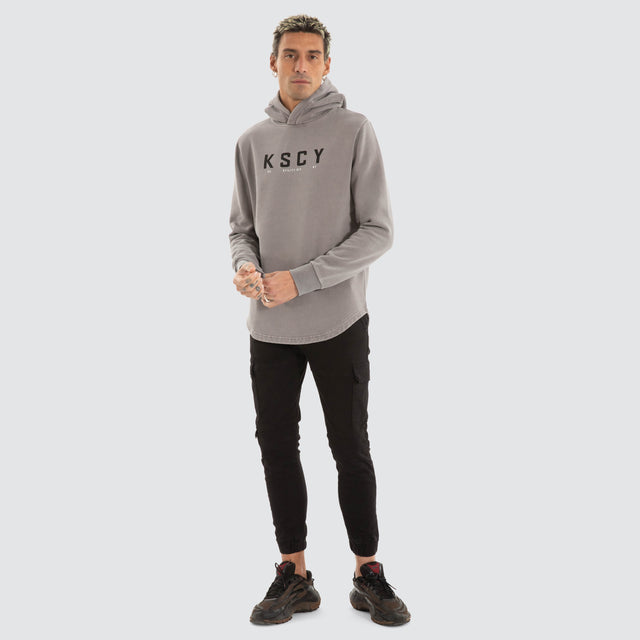 model wears Wander Dual Curved Hoodie Pigment Frost Grey Hoodies Grey - image 2