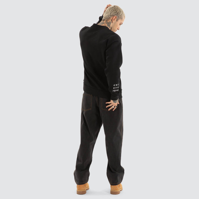 model wears System Relaxed Sweater Jet Black Jumpers Black - image 2