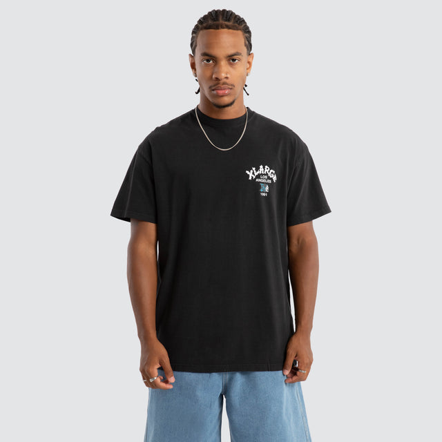 model wears Skull LA Box Fit Tee Pigment Black T-Shirts Black - image 2