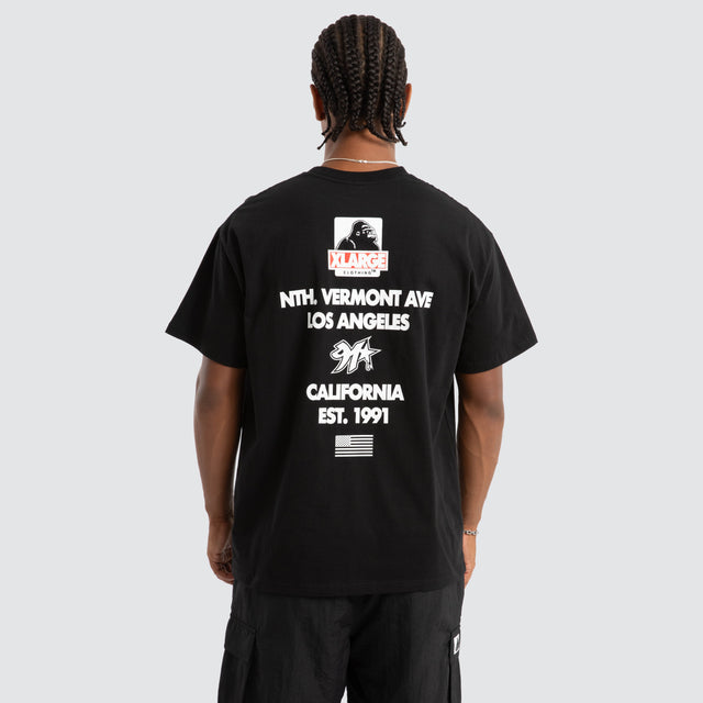 model wears Stack Box Fit Tee Black T-Shirts Black - image 1