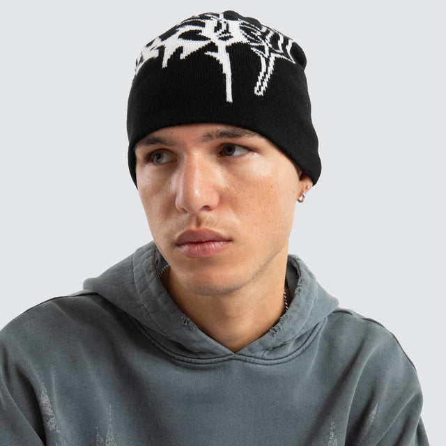 model wears Obsidian Beanie Jet Black Headwear Black - image 3