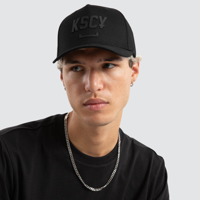 model wears Callisto Cap Jet Black Caps Black - image 1