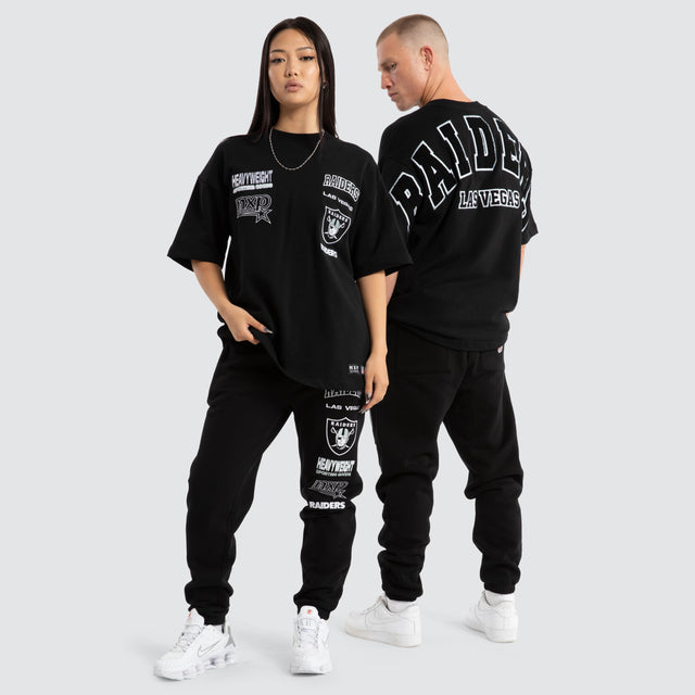 model wears Las Vegas Raiders Kickoff Trackpant Jet Black Trackpants Black - image 2