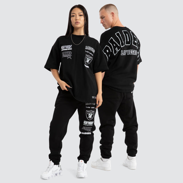 model wears Las Vegas Raiders Surround Loopback Tee Jet Black T-Shirts Black - image 2