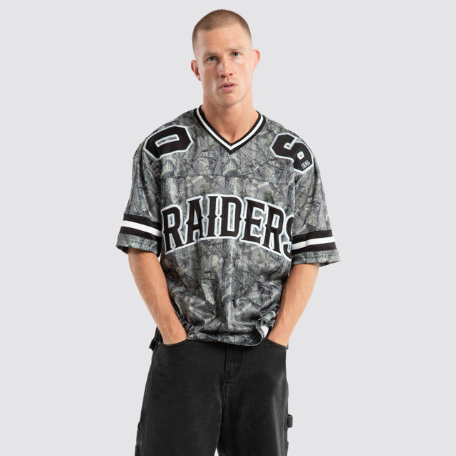 model wears Las Vegas Raiders Backfield Jersey Camo Jerseys Grey - image 1