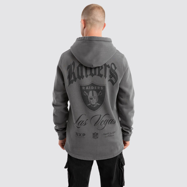 model wears Las Vegas Raiders Defence Dual Curved Hoodie Pigment Charcoal Hoodies Grey - image 1