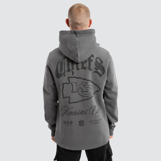 model wears Kansas City Chiefs Defence Dual Curved Hoodie Pigment Charcoal Hoodies Grey - image 1