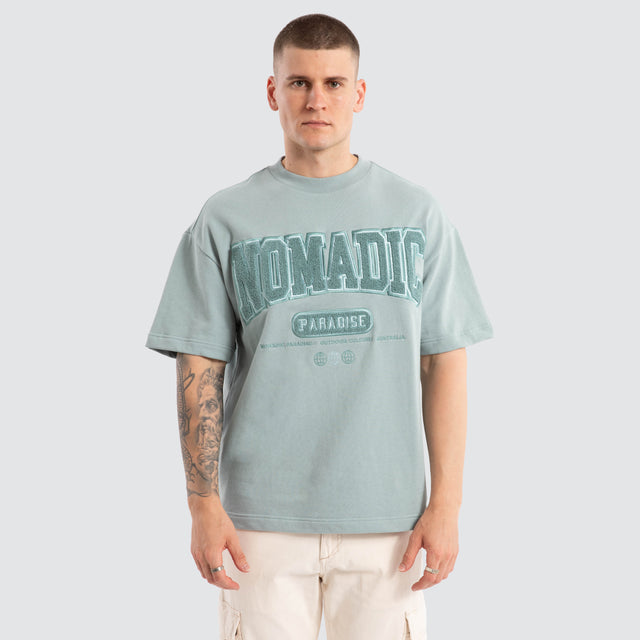 model wears College Loopback Street Tee Slate T-Shirts Green - image 1