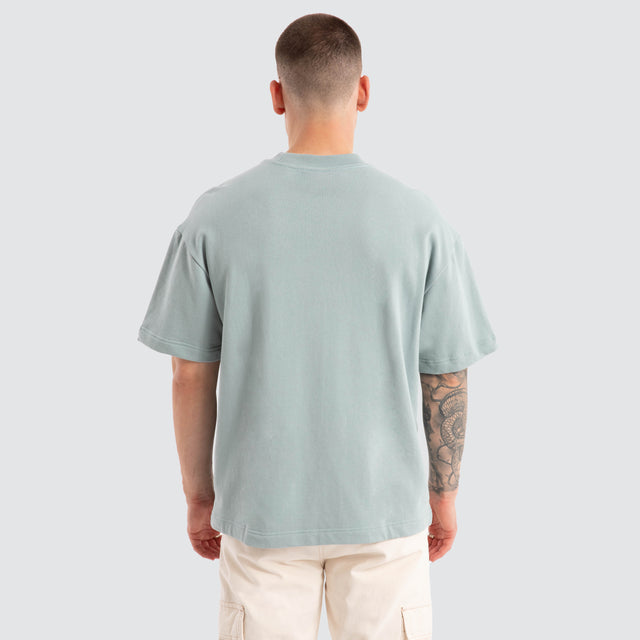 model wears College Loopback Street Tee Slate T-Shirts Green - image 2
