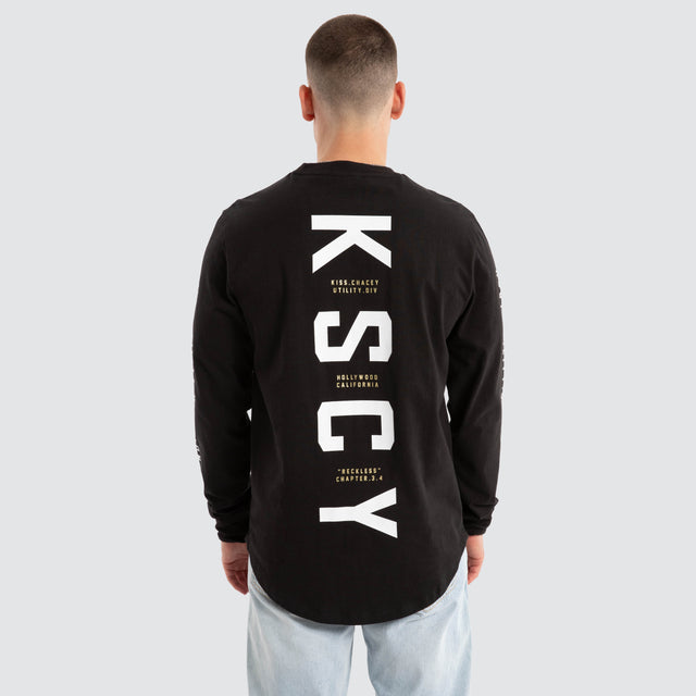 model wears Lancer Dual Curved Longsleeve Tee Jet Black Longsleeve T-Shirts Black - image 1
