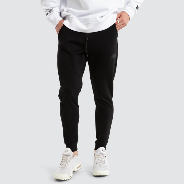 model wears Novas Trackpant Jet Black Trackpants Black - image 1