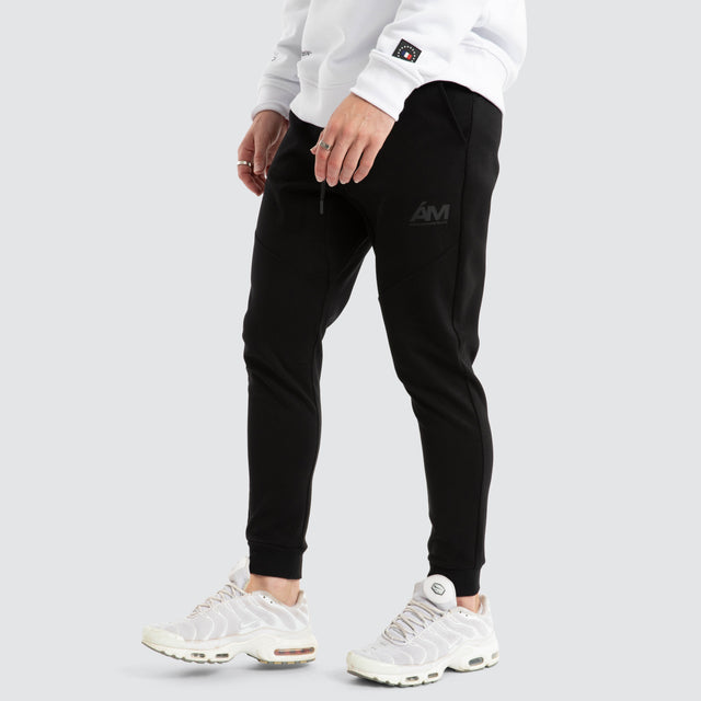 model wears Novas Trackpant Jet Black Trackpants Black - image 3