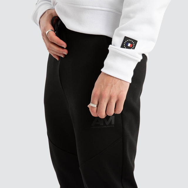 model wears Novas Trackpant Jet Black Trackpants Black - image 5