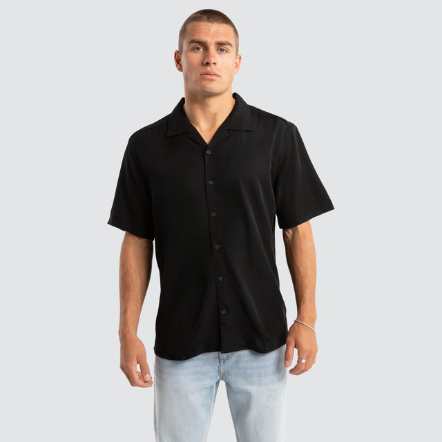 model wears Hali Cropped Resort Shirt Black Short Sleeve Shirts Black - image 1