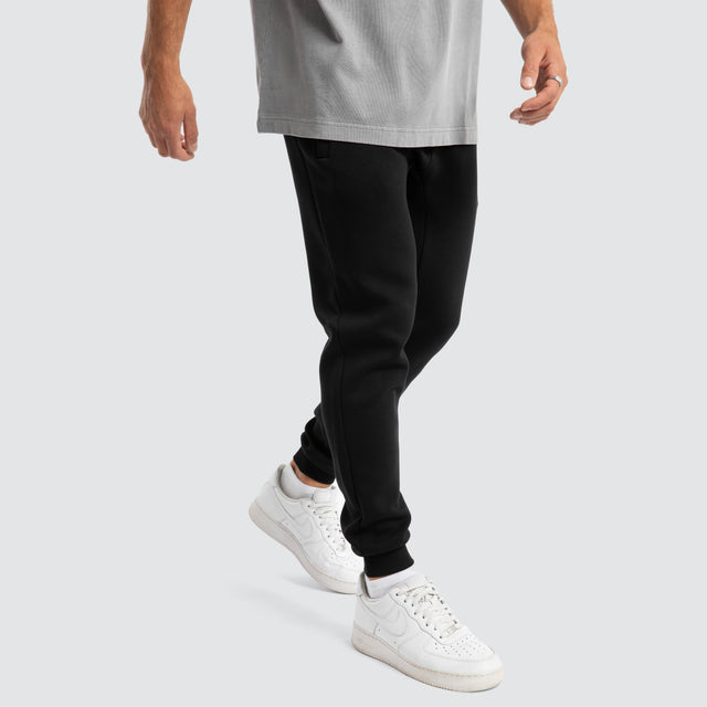 model wears Diversion Slim Trackpant Jet Black Trackpants Black - image 6