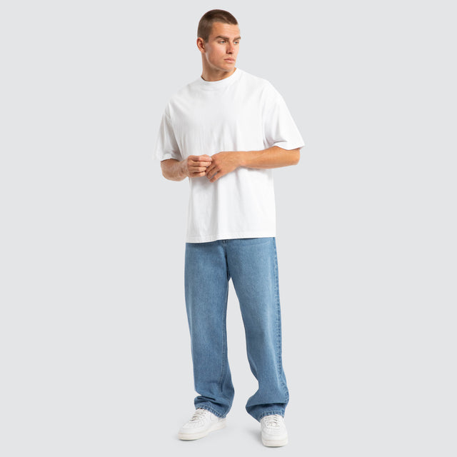 model wears Drive Athletic Baggy Jean Washed Blue Pants Blue - image 3
