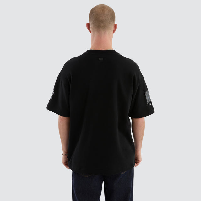 model wears Carlton Blues AFL Game-On Loopback Tee Jet Black T-Shirts Black - image 6