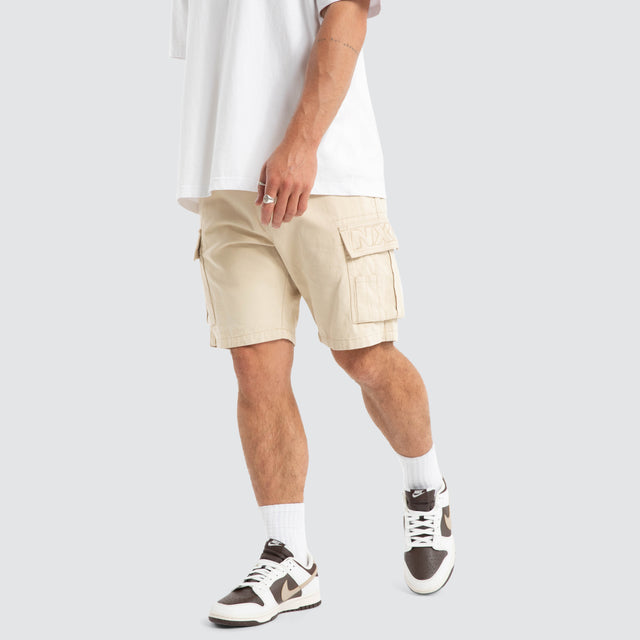 model wears Colby Cargo Shorts Bone Neutral Shorts Cream - image 1