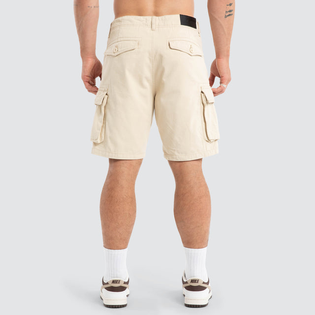 model wears Colby Cargo Shorts Bone Neutral Shorts Cream - image 6