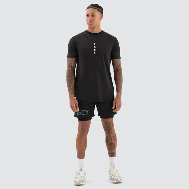 model wears Fortify Raglan Dual Curved Active Tee Black/Asphalt T-Shirts Black - image 4