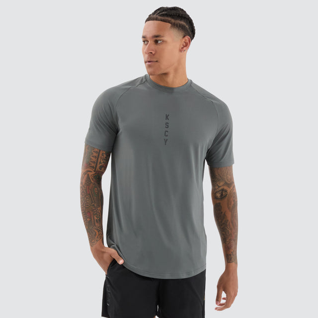model wears Fortify Raglan Dual Curved Active Tee Shadow/Jet Black T-Shirts Black - image 1