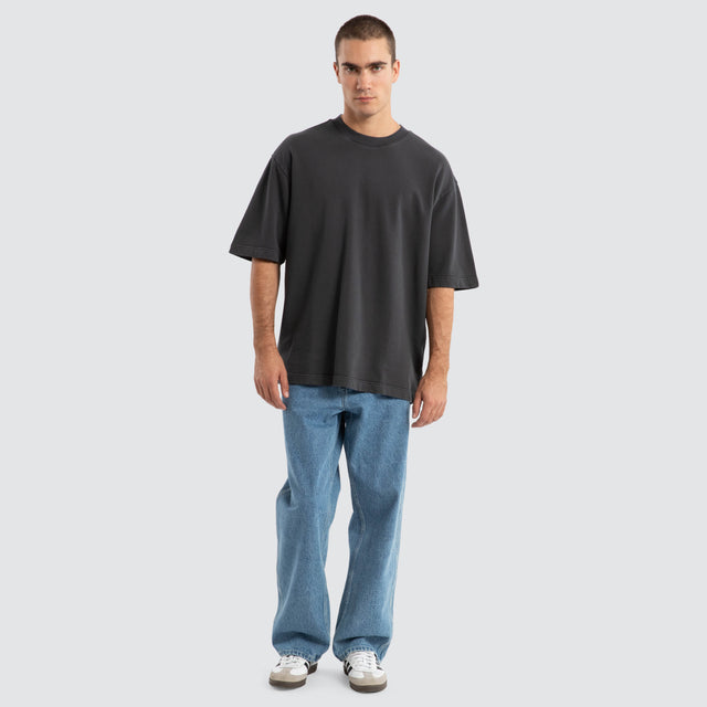 model wears Dillon Baggy Fit Jean Clean Blue Pants Blue - image 3