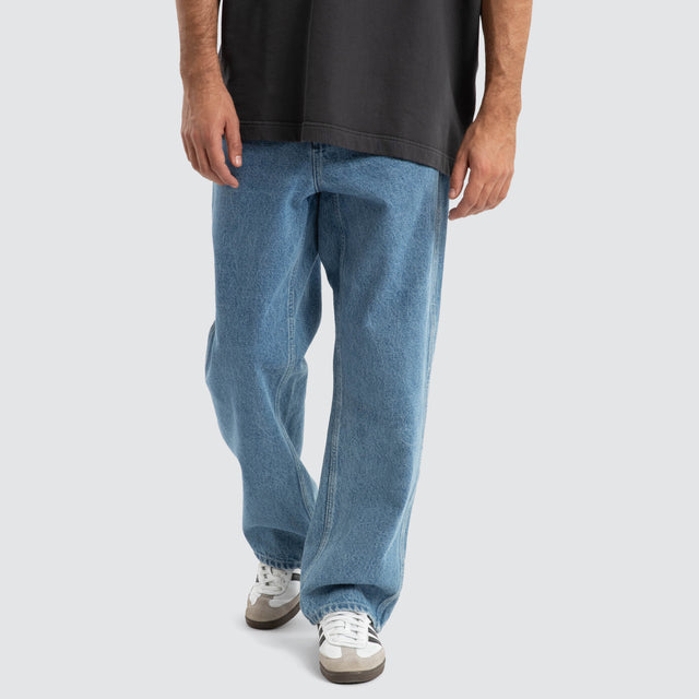model wears Dillon Baggy Fit Jean Clean Blue Pants Blue - image 4
