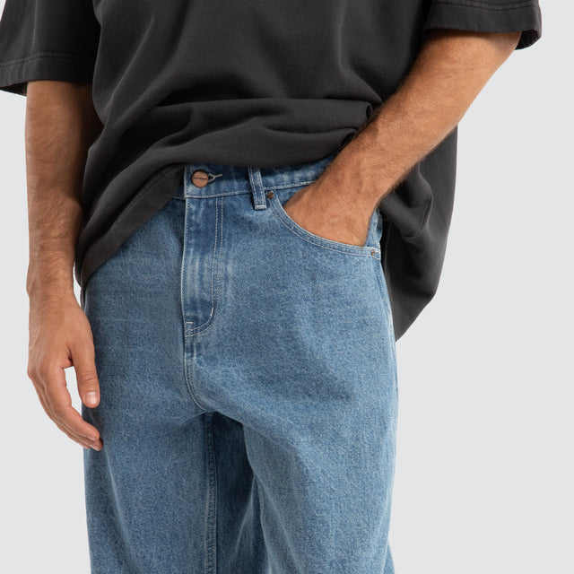 model wears Dillon Baggy Fit Jean Clean Blue Pants Blue - image 6