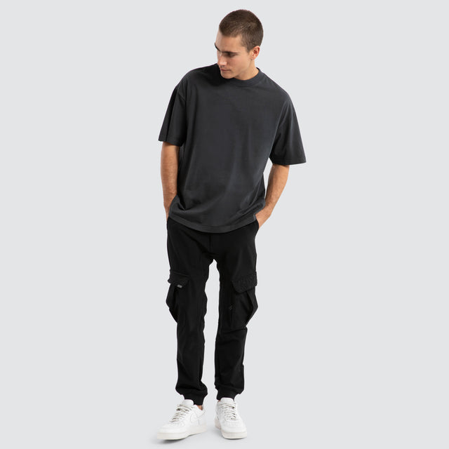 model wears F150 Slim Nylon Cargo Jogger Black Pants Black - image 2