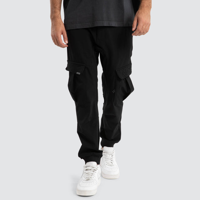 model wears F150 Slim Nylon Cargo Jogger Black Pants Black - image 1