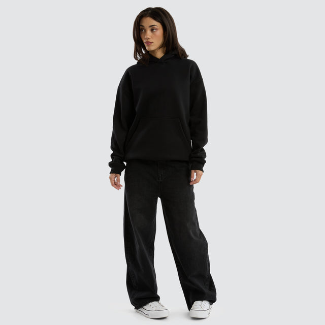 model wears Weyburn Relaxed Hoodie Jet Black Hoodies Black - image 7
