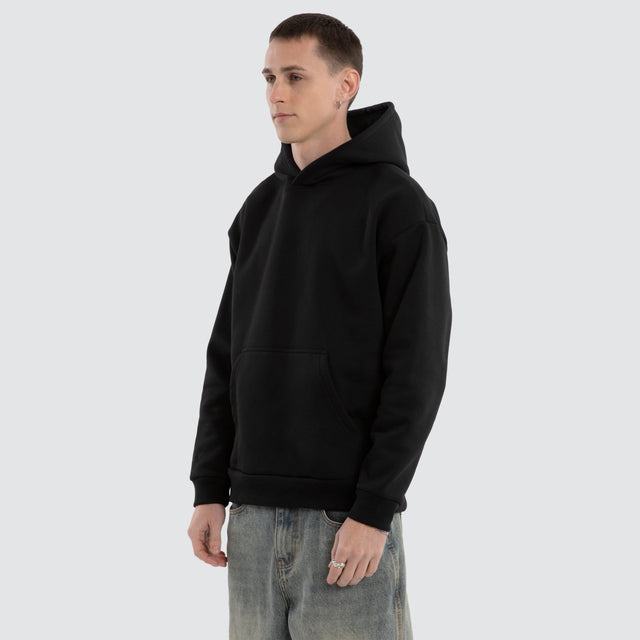 model wears Weyburn Relaxed Hoodie Jet Black Hoodies Black - image 5