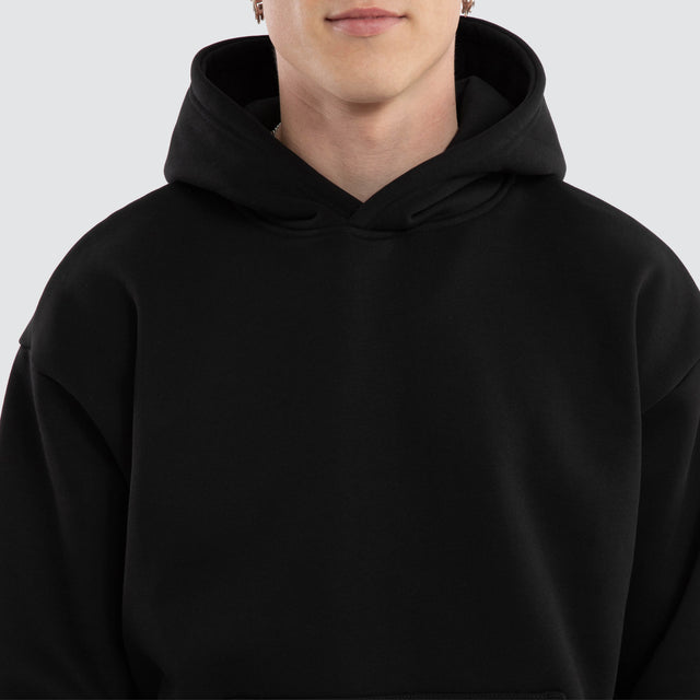 model wears Weyburn Relaxed Hoodie Jet Black Hoodies Black - image 3