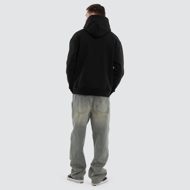 model wears Weyburn Relaxed Hoodie Jet Black Hoodies Black - image 6
