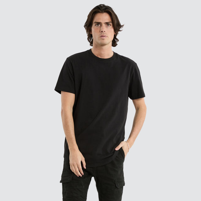 model wears Prairie Dual Curved Tee Jet Black T-Shirts Black - image 1