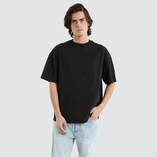 model wears Havre Heavy Street Tee Jet Black T-Shirts Black - image 1