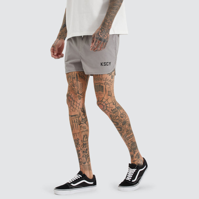 model wears Mercury Runner Short Alloy Shorts Grey - image 1