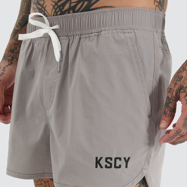model wears Mercury Runner Short Alloy Shorts Grey - image 2