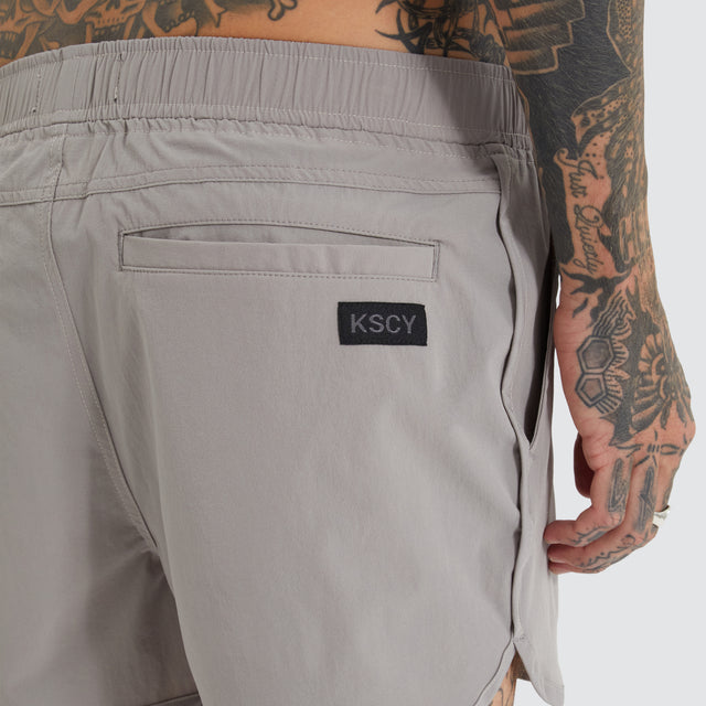 model wears Mercury Runner Short Alloy Shorts Grey - image 5