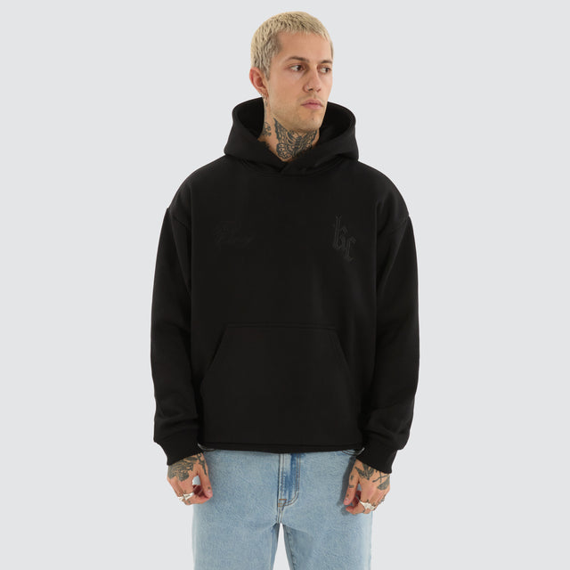 model wears Chained Relaxed Hoodie Jet Black Hoodies Black - image 3