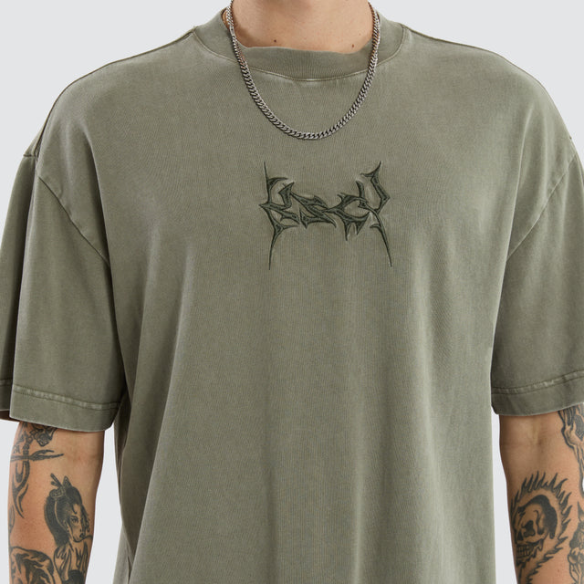 model wears Fangs Street Tee Mineral Dusty Olive T-Shirts Green - image 4