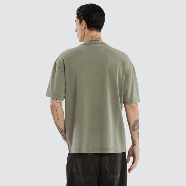 model wears Fangs Street Tee Mineral Dusty Olive T-Shirts Green - image 3