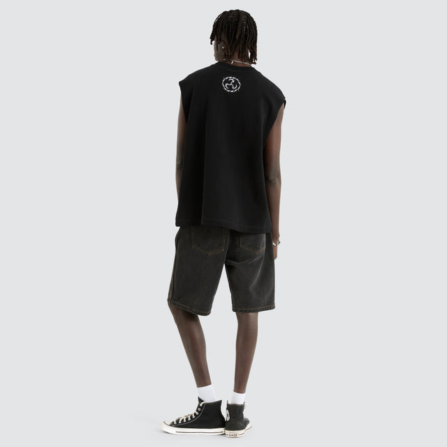 model wears System Loopback Mechanic Muscle Black Muscle Tees Black - image 5
