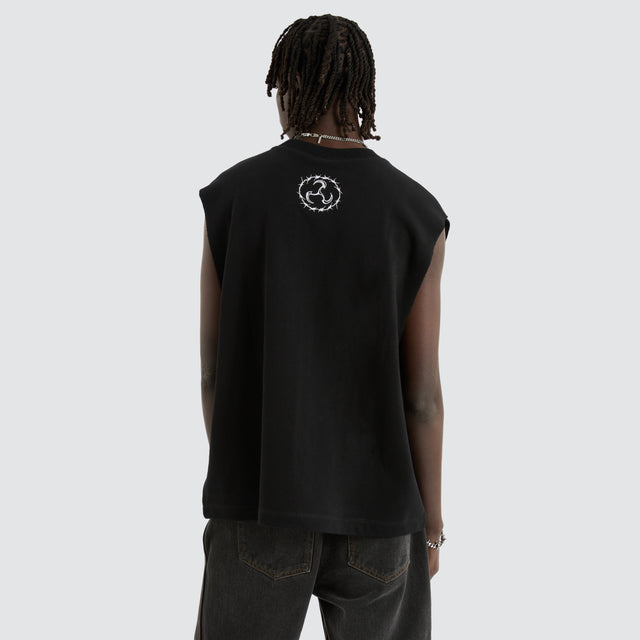 model wears System Loopback Mechanic Muscle Black Muscle Tees Black - image 3