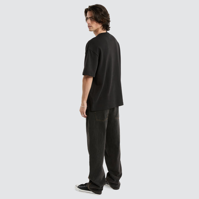 model wears Cassius Loopback Street Tee Jet Black T-Shirts Black - image 2