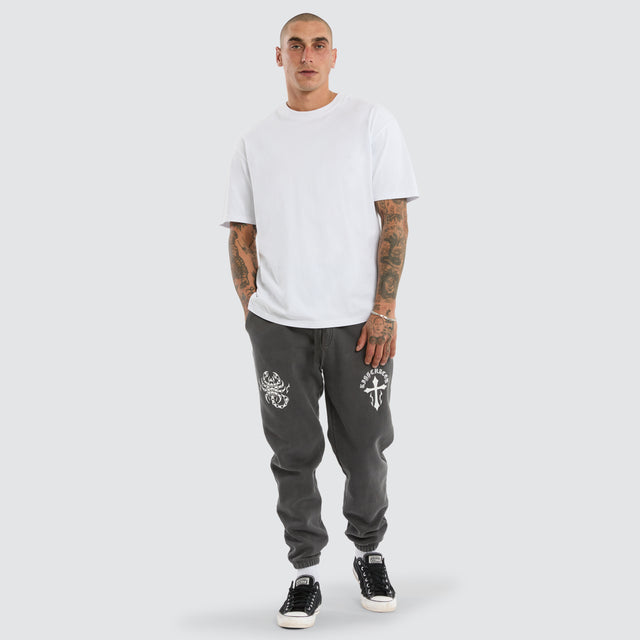 model wears Heroic Trackpant Pigment Asphalt Trackpants Grey - image 2