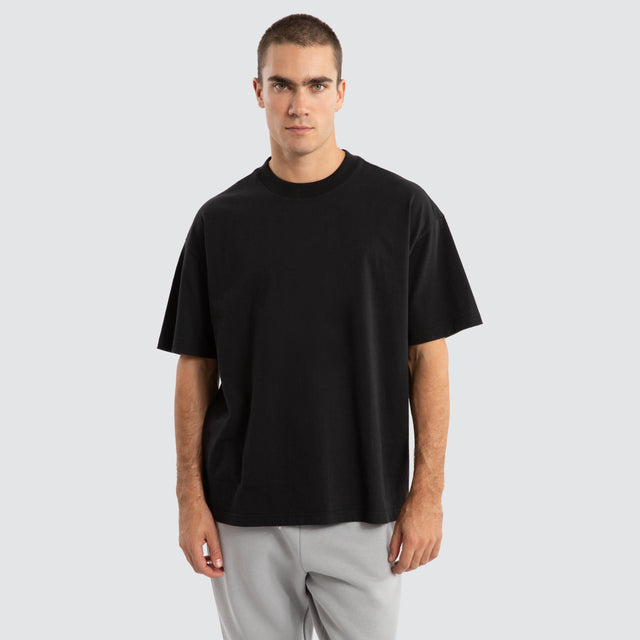 model wears Melville Raptor Tee Jet Black T-Shirts Black - image 1