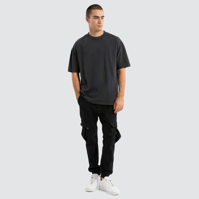 model wears Melville Raptor Tee Pigment Black Sand T-Shirts Black - image 2