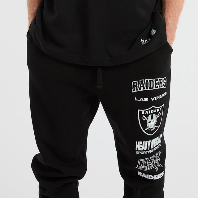 model wears Las Vegas Raiders Kickoff Trackpant Jet Black Trackpants Black - image 3